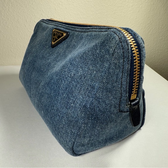 Prada Handbags - Prada Blue Denim Cosmetic Pouch with Gold Hardware
